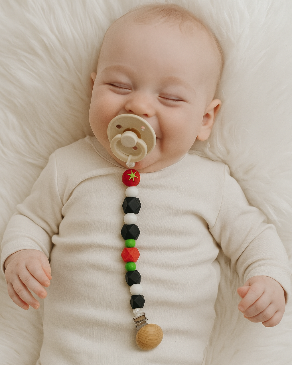 Attache sucette Tomate Noir en silicone hypoallergénique avec clip solide pour bébé