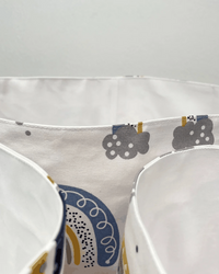 Paniers de rangement bébé réversibles – Collection Happiness Bleu 